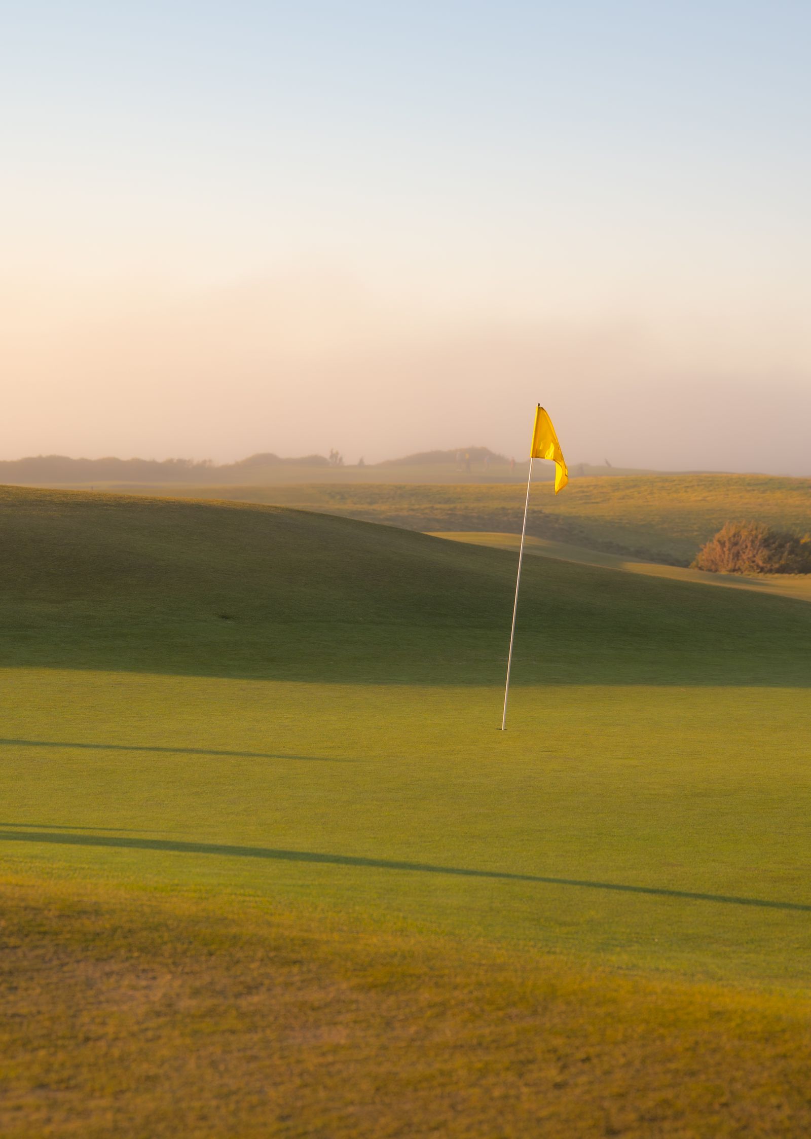 Golf green at sunrise
